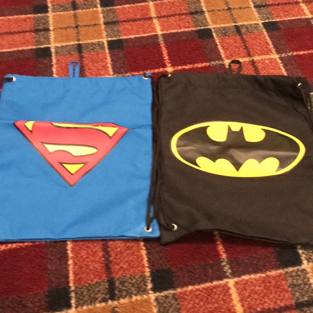 Superman and Batman draw string bags. No tears, no pulls, no stains